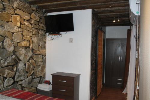 TV a/nebo společenská místnost v ubytování Hotel Manada del Desierto