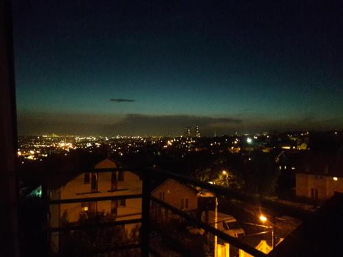 a view of a city at night at Apartments & Rooms -MDL Lazić in Belgrade