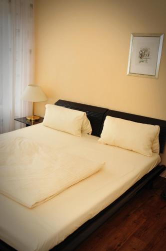 Ein Bett oder Betten in einem Zimmer der Unterkunft Hotel Litjes