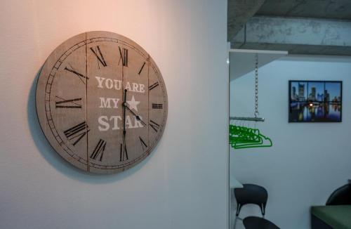 a clock on a wall with the words you are my star at Tbilisi Apartment*Studio Gorgasali in Tbilisi City