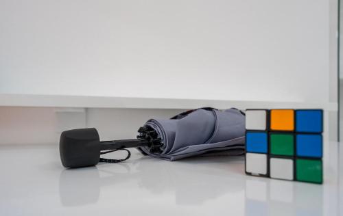 an object is laying on the floor next to blocks at Tbilisi Apartment*Studio Gorgasali in Tbilisi City