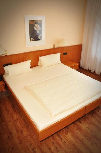 Ein Bett oder Betten in einem Zimmer der Unterkunft Hotel Litjes