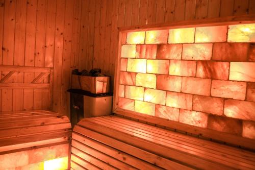 a corner of a sauna with a wooden wall at Lake View Hotel in Quy Nhon