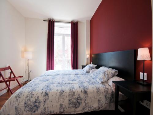 Posteľ alebo postele v izbe v ubytovaní Apartamentos Murallas de Sevilla