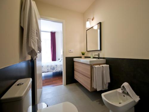 Kúpeľňa v ubytovaní Apartamentos Murallas de Sevilla