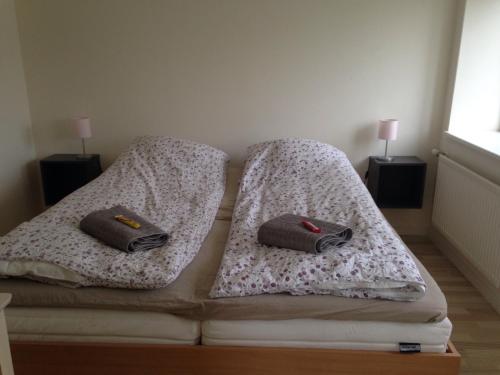 Säng eller sängar i ett rum på Vemmingbundvejens Ferielejlighed