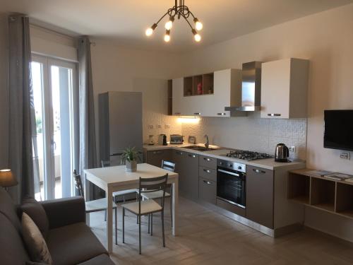 Dapur atau dapur kecil di Le Domus Modern Apartments Cagliari