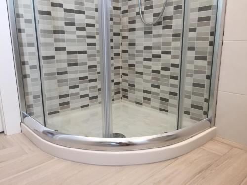 Bilik mandi di Le Domus Modern Apartments Cagliari