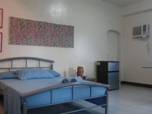 Giường trong phòng chung tại JS3 Studio Apartments