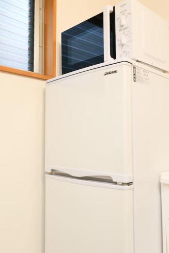 Kuchyň nebo kuchyňský kout v ubytování Tokaichi inn 一軒家貸切