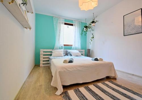 Giường trong phòng chung tại Apartament plażowy Ukiel