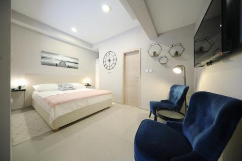 Televízia a/alebo spoločenská miestnosť v ubytovaní Teatro Verdi Accommodation