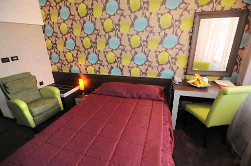 Postel nebo postele na pokoji v ubytování Hotel Leipzig