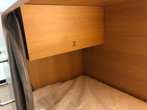 a cupboard with a drawer in a room at Andaina in Sarria