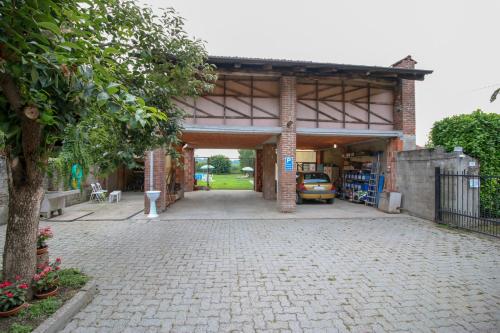 a garage with a car parked inside of it at Spighe Paglia e Girasole in Candia Canavese
