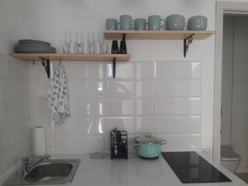 Η κουζίνα ή μικρή κουζίνα στο Romantic Apartment on Rynok square with Air-Conditioning