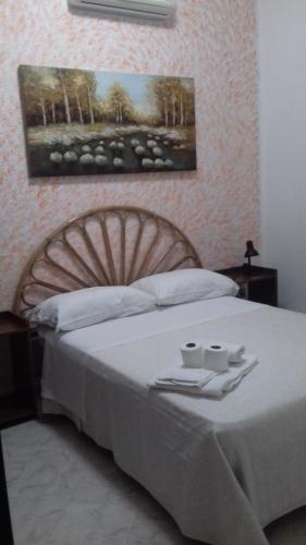 Cama ou camas em um quarto em Albergo San Rocco
