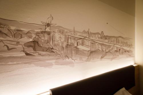 a drawing of a mural on a wall at Shin Osaka Esaka Tokyu REI Hotel in Suita