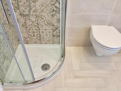Bilik mandi di Le Domus Modern Apartments Cagliari