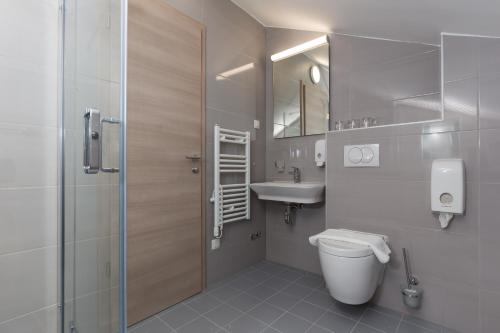Koupelna v ubytování Hotel Vimbula - Komolac