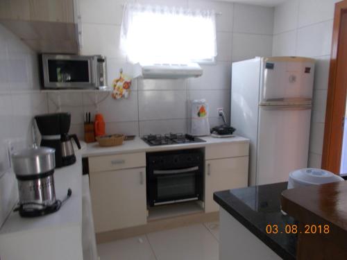 Η κουζίνα ή μικρή κουζίνα στο Cote Dazur Residence Imbassai