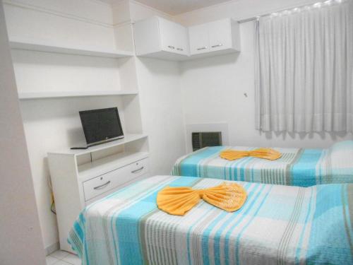 Postel nebo postele na pokoji v ubytování Apartamento Maximum