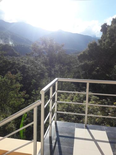 a balcony with a view of the mountains at Gran Hotel Virrey in San Ramón
