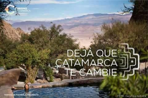 a sign that reads delta cue calamarca tesaccoaccoacco at Hostal Sisabel in Tinogasta
