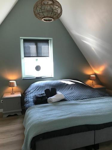 Ein Bett oder Betten in einem Zimmer der Unterkunft Logies Zen & Zilt Veere