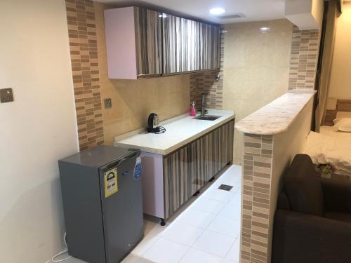 Ένα ή περισσότερα κρεβάτια σε δωμάτιο στο رؤية عنيزة - Vision of Onaizah