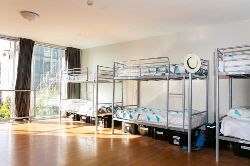 Ένα ή περισσότερα κρεβάτια σε δωμάτιο στο Barkly Backpackers