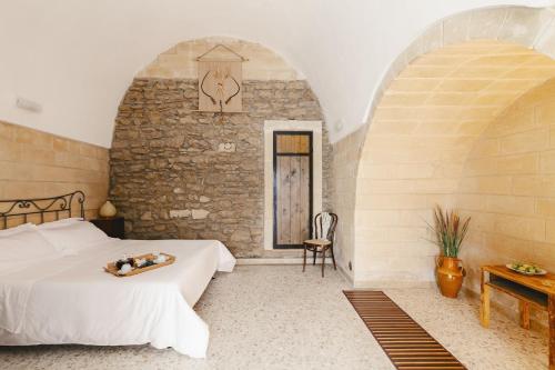 Posteľ alebo postele v izbe v ubytovaní Il Borgo Ritrovato - Albergo Diffuso