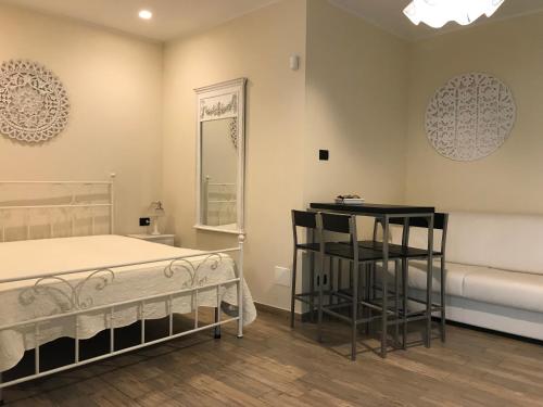 Кровать или кровати в номере Bed and Breakfast Sun Wine