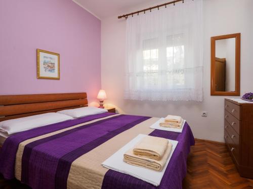 Postel nebo postele na pokoji v ubytování Relaxing Seaview Apartment Barac on Separated Floor