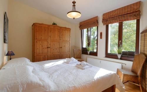Ένα ή περισσότερα κρεβάτια σε δωμάτιο στο Sonnenvilla Heringsdorf