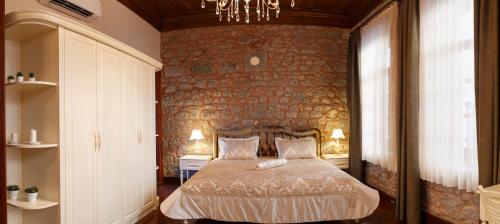 Katil atau katil-katil dalam bilik di Verula City Luxury Villa