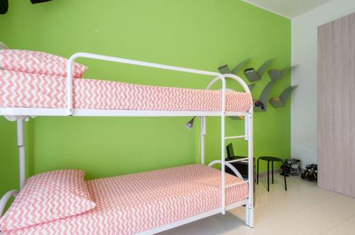 Postel nebo postele na pokoji v ubytování Cozy Nest