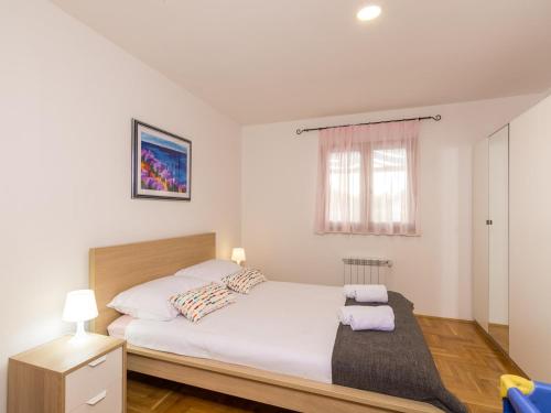 Postel nebo postele na pokoji v ubytování Villa Nika