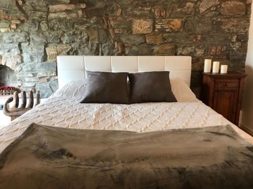 Кровать или кровати в номере Casa In Piazza