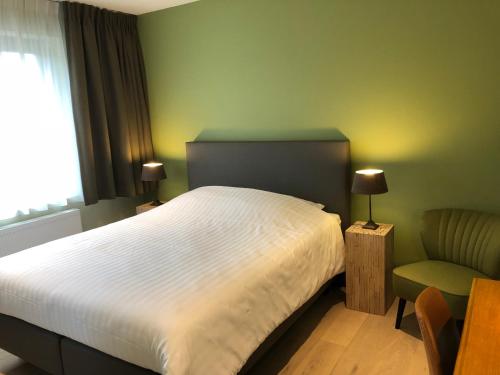 Postel nebo postele na pokoji v ubytování B&B Garden55