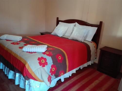 Una cama o camas en una habitación de Casa Dorada