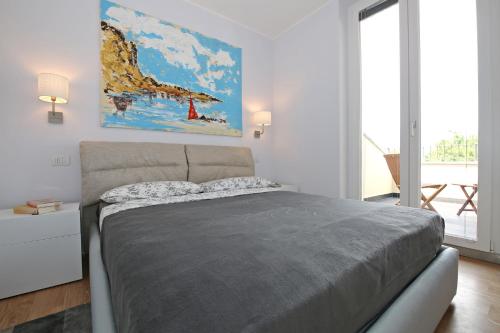 En eller flere senge i et værelse på Cà Stagia