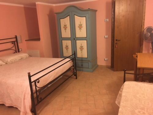 Postel nebo postele na pokoji v ubytování B&B Marina
