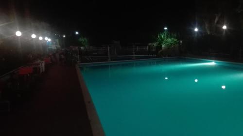 an empty swimming pool at night at Villaggio Costa d'Argento in San Vito Chietino