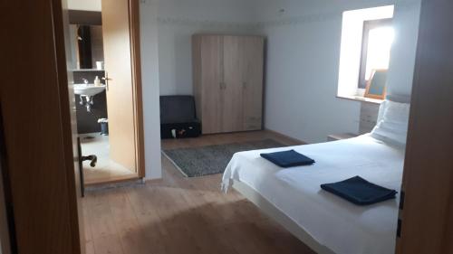 Postel nebo postele na pokoji v ubytování Villa Macini