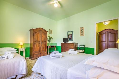 Postel nebo postele na pokoji v ubytování Locanda il Fornello