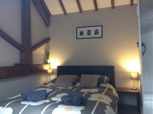 Voodi või voodid majutusasutuse Skip To The Zipwire toas