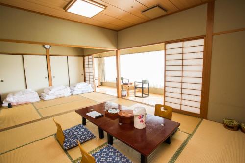 ホテルグリーンヒル鹿児島にあるベッド