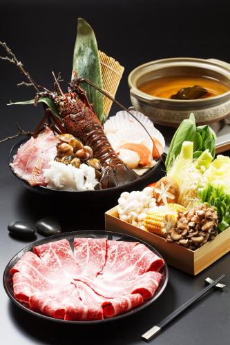 a bunch of different types of food on a table at 礁溪晶泉丰旅 Wellspring by Silks Jiaoxi in Jiaoxi