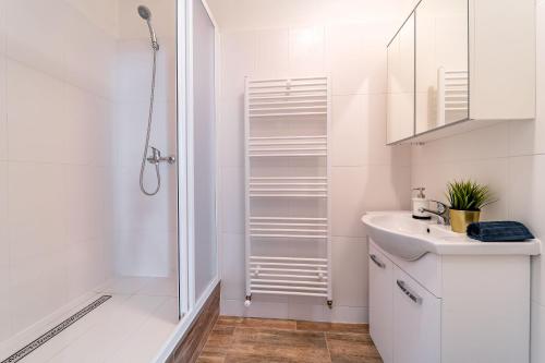 Kuchyňa alebo kuchynka v ubytovaní Avantguard Apartments